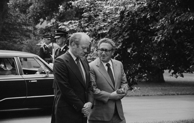 Ford and Kissinger conversing on grounds of White House 16 Aug 1974 642x410